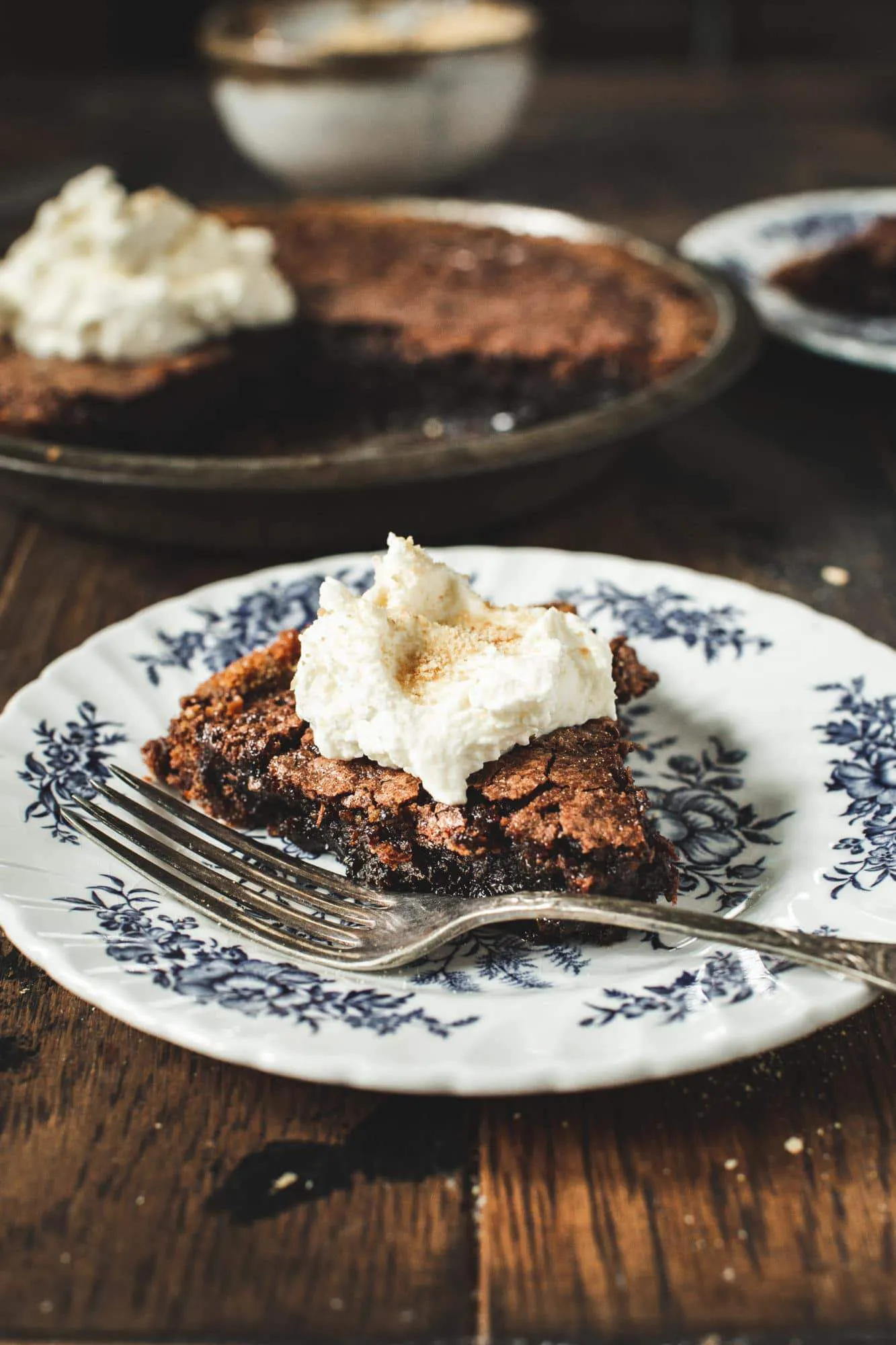 slice of fudge pie on blue and white china