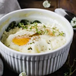 baked eggs in white ramekin