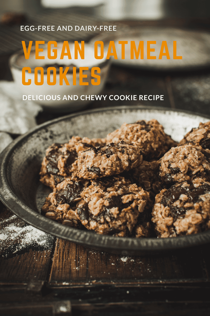 Chocolate chip oatmeal cookies in a metal pie tin.