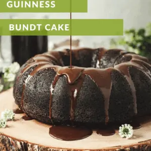 Guinness Chocolate Cake on a tree stump board.