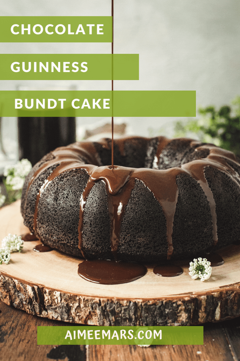 Guinness Chocolate Cake on a tree stump board.