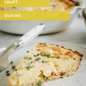 Yellow and white titled slice of quiche on white plate.