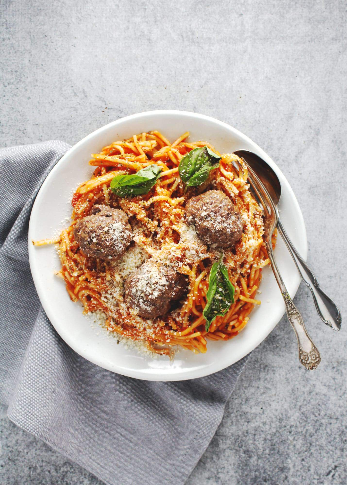 This recipe is a quick and easy dinner meal for when you're tired or want something easy and good that everyone will eat. Plus it's gluten free! | via @AimeeMarsLiving | #Spaghetti #Meatballs #GlutenFree