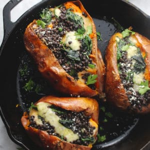 Loaded Vegetarian Sweet Potatoes in a black skillet.