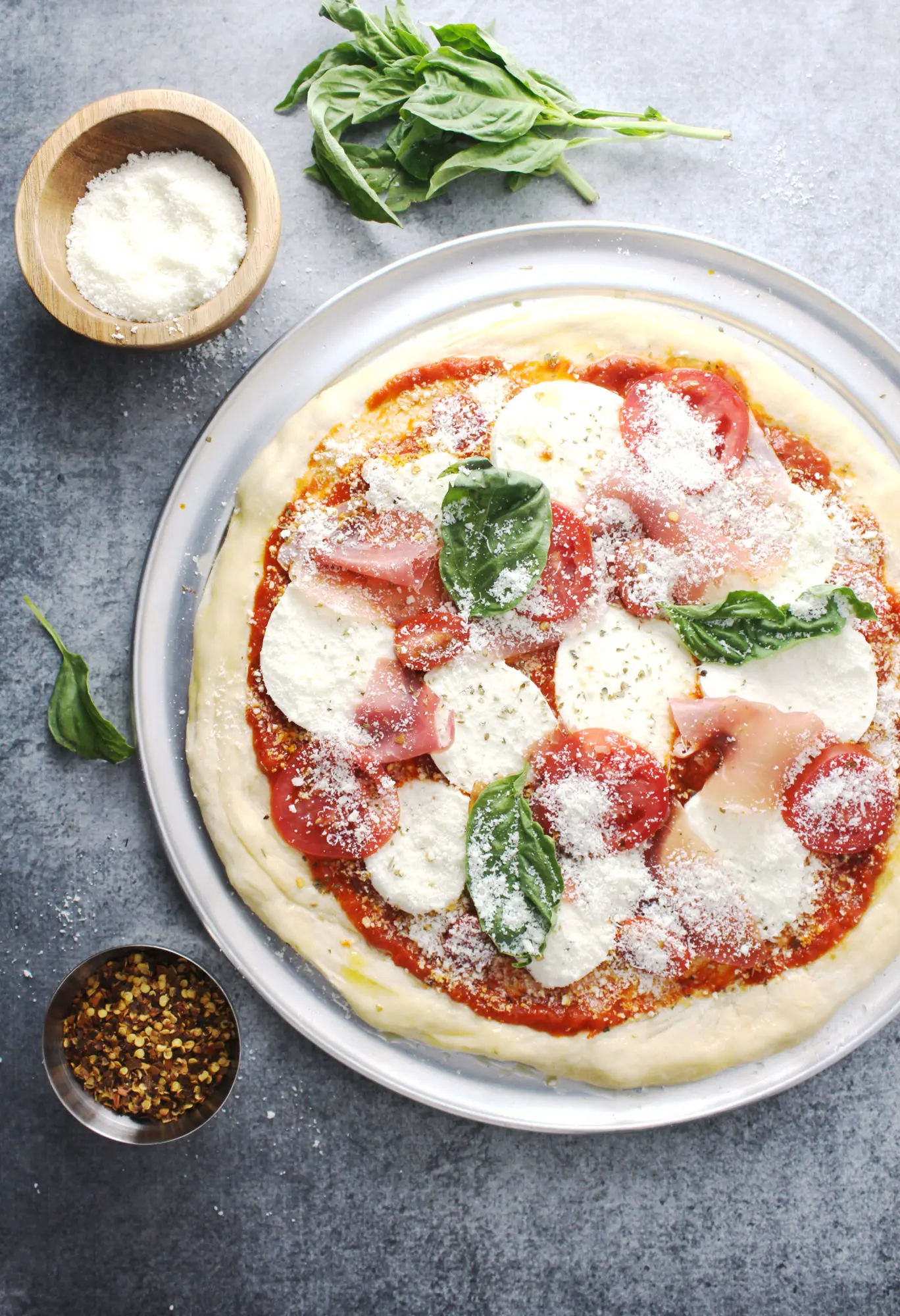 mozzarella pizza ingredients ready to be cooked