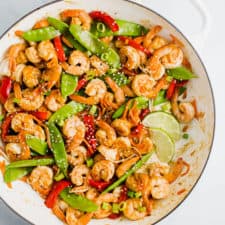 Miso Glazed Shrimp Stir-Fry in a white skillet