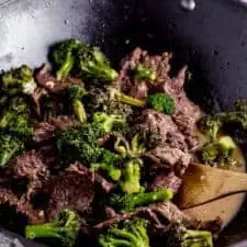 beef and broccoli stir fry in wok