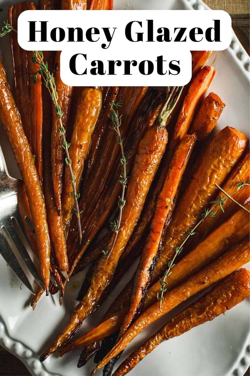 Easy honey glazed carrots topped with fresh thyme.