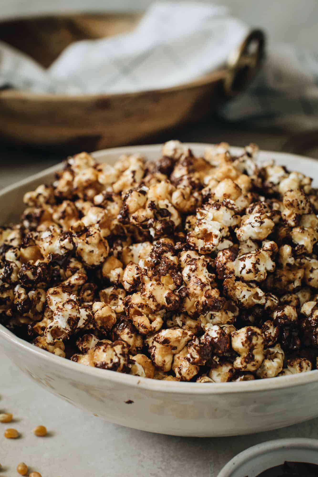 chocolate caramel popcorn in white bowl
