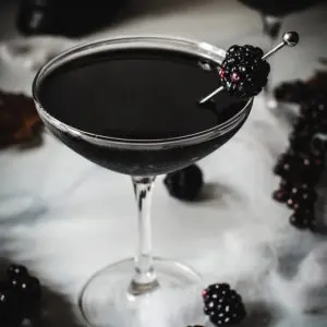 Black widow Halloween cocktail in a glass.