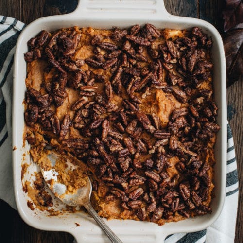 healthy sweet potato casserole with silver spoon