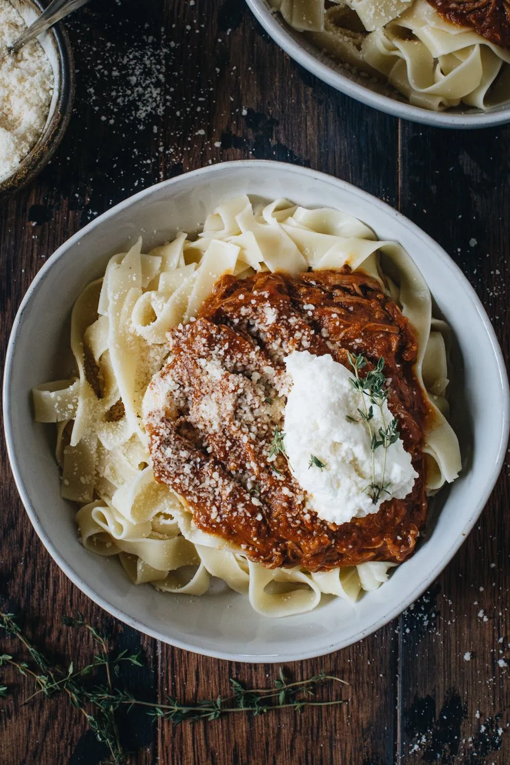 slow cooker beef and pumpkin ragu set on wooden table