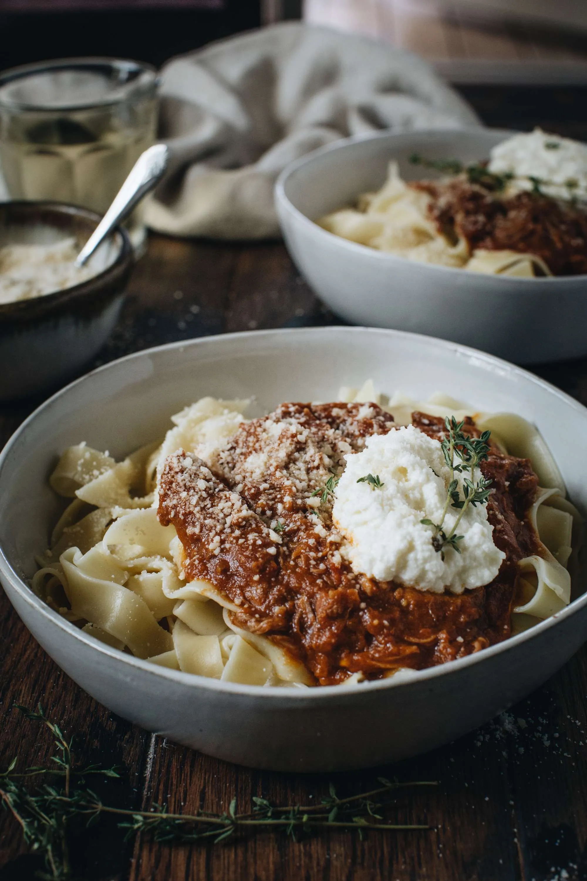 slow cooker beer and pumpkin ragu set on wooden table