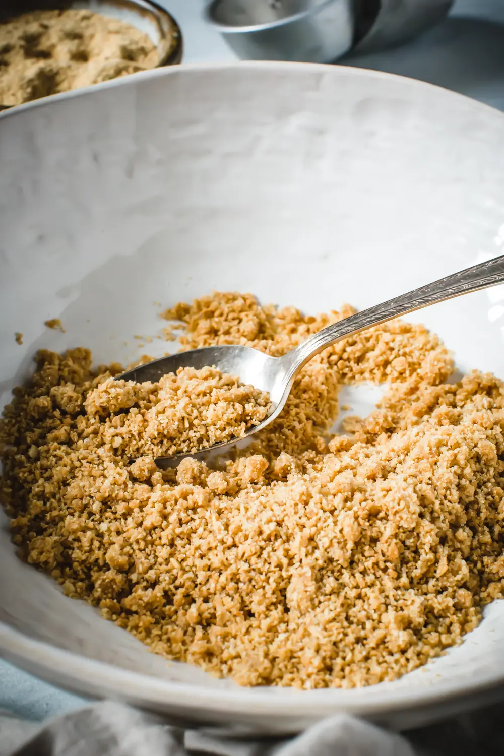 graham cracker crust ingredients in white bowl