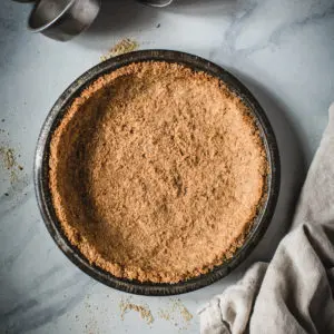 graham cracker crust in pie tin