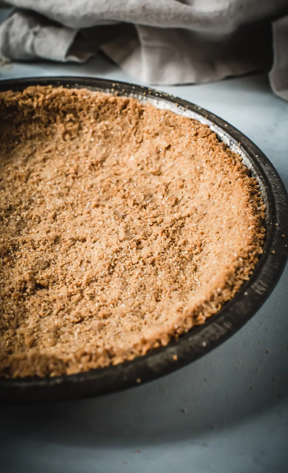 graham cracker crust in pie tin