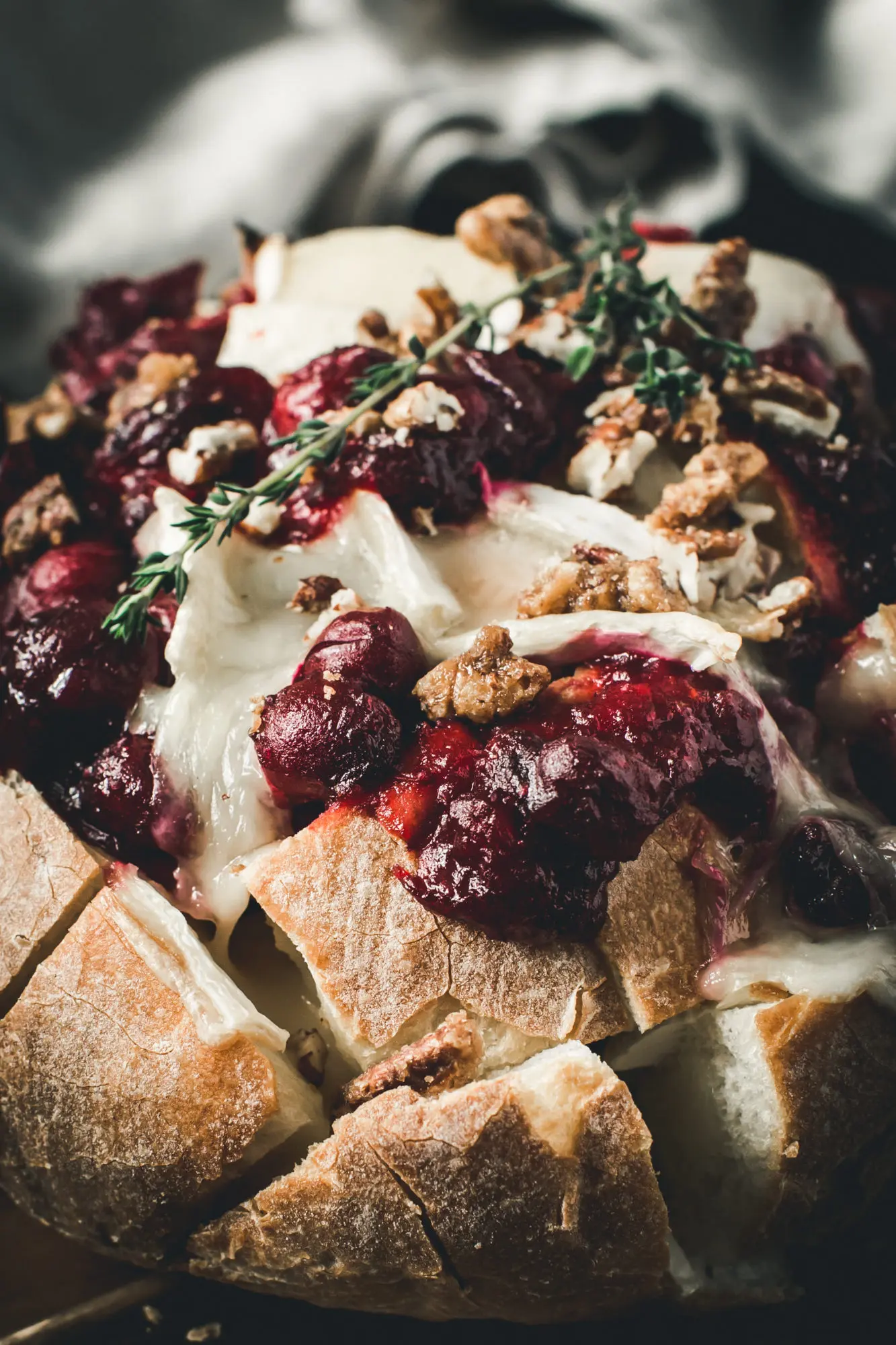 cranberry brie pull apart bread with thyme on top