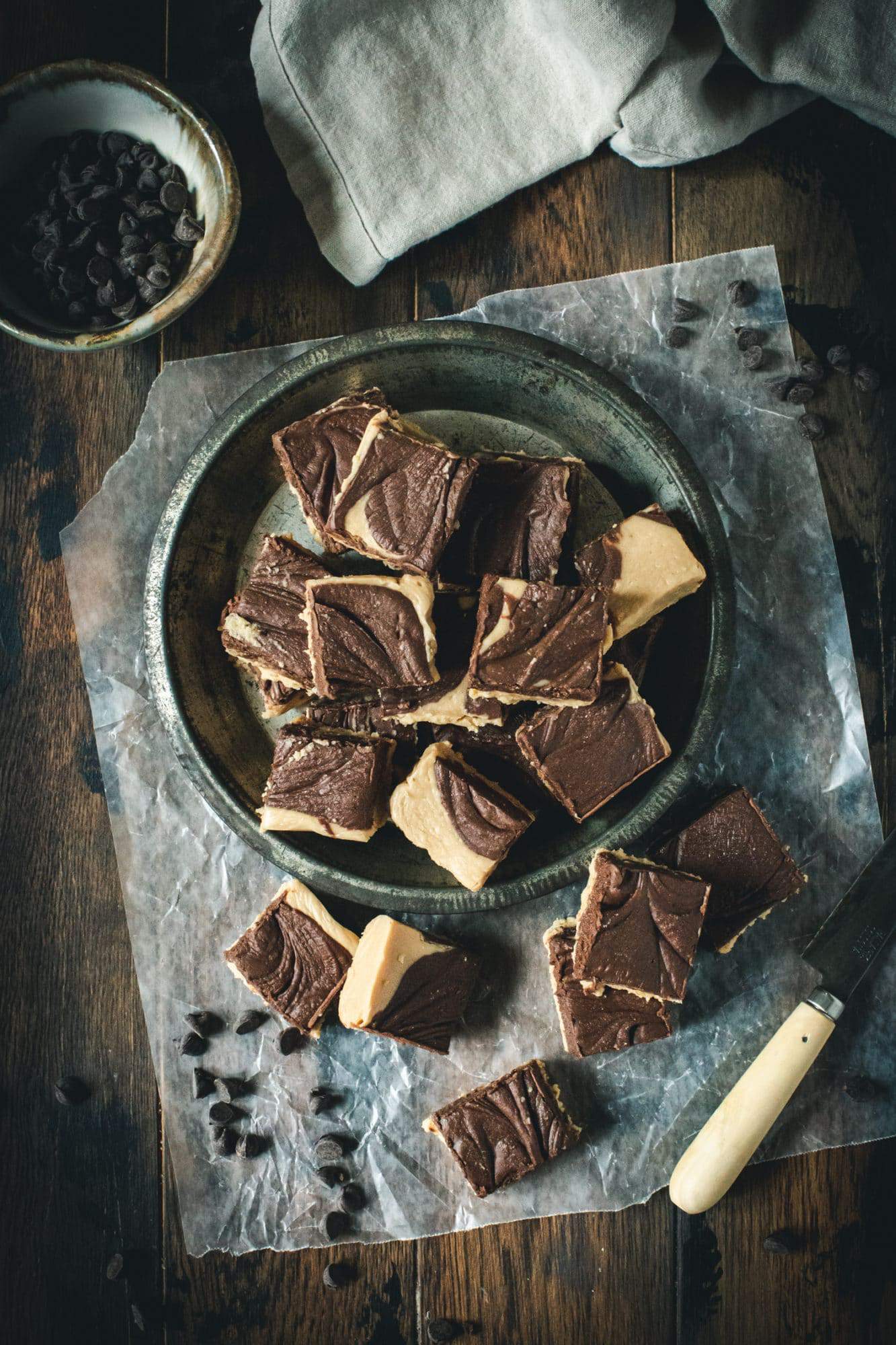 fudge in a pie tin on top of parchment paper