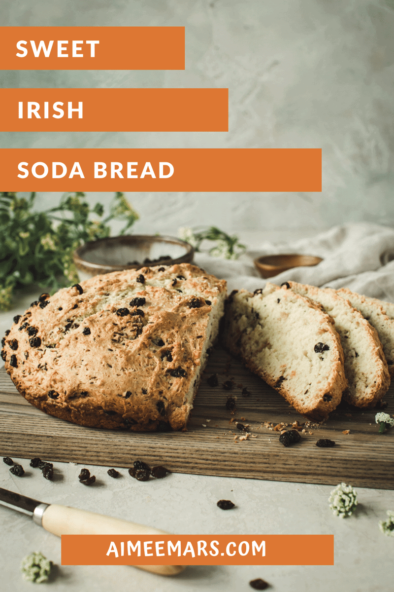 Irish soda bread sliced on a cutting board.