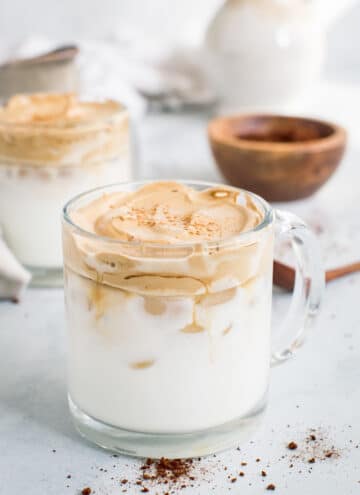 Dalgona Whipped Coffee in clear glass mugs.