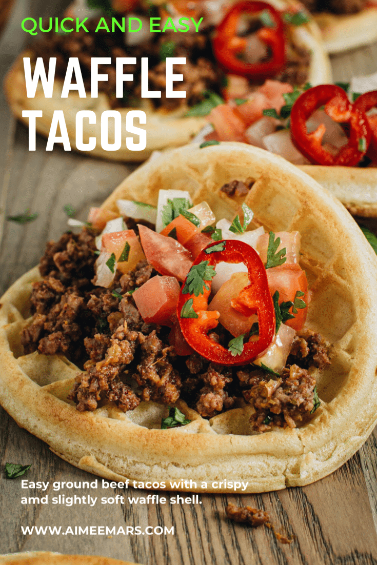 waffle taco with ground beef on wooden cutting board