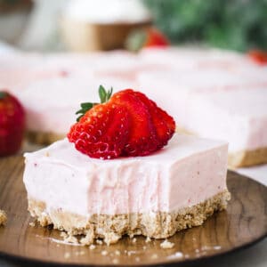 Strawberry Cheesecake Bar with slice cut out