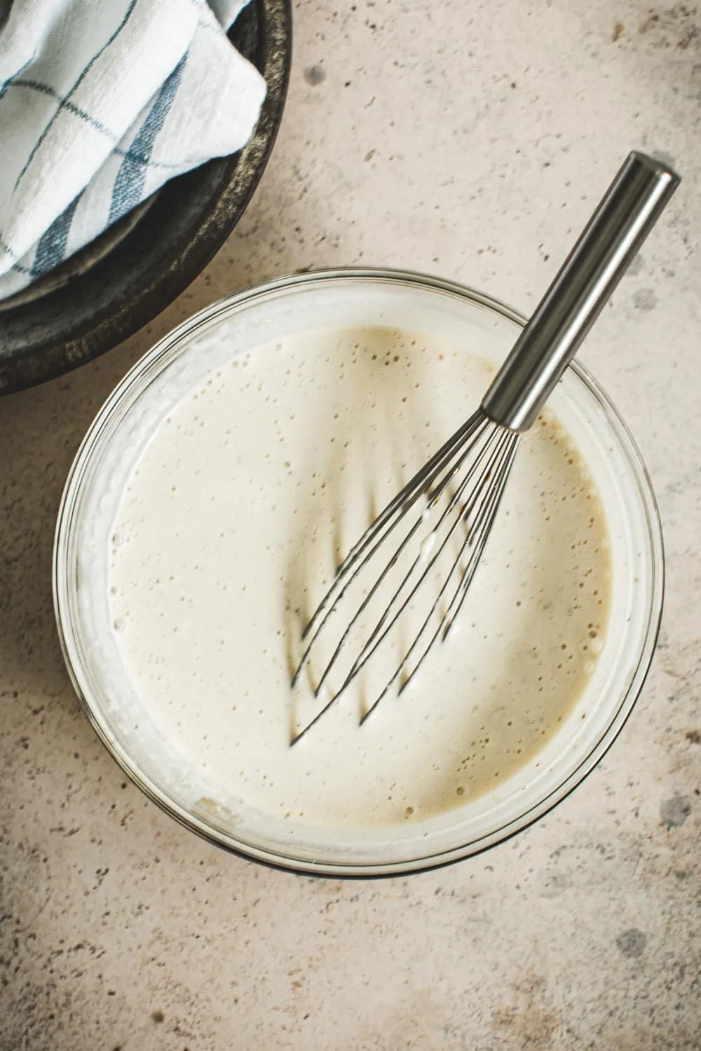 Alabama white sauce mixture in mixing bowl.