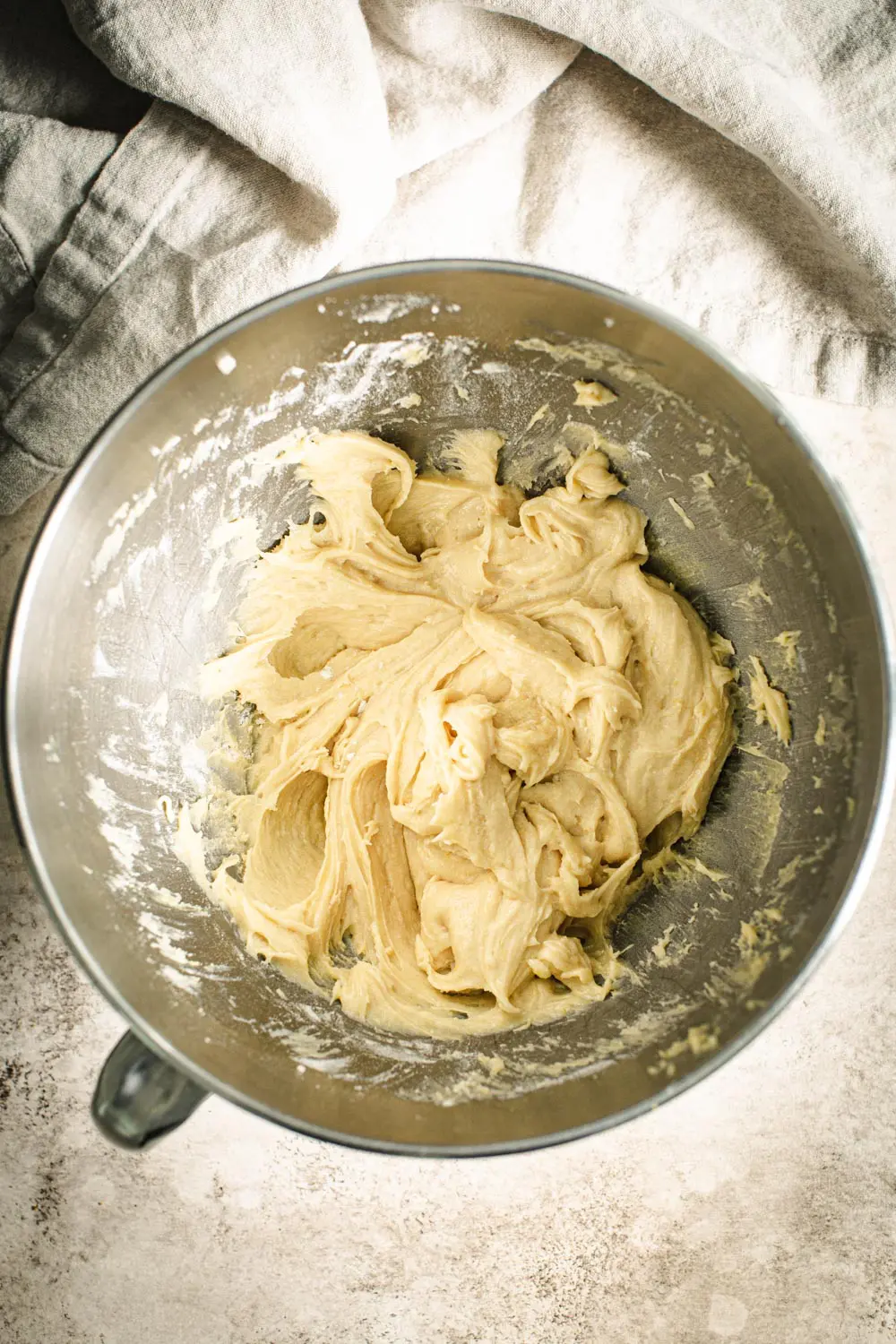 Torte batter in silver mixing bowl.