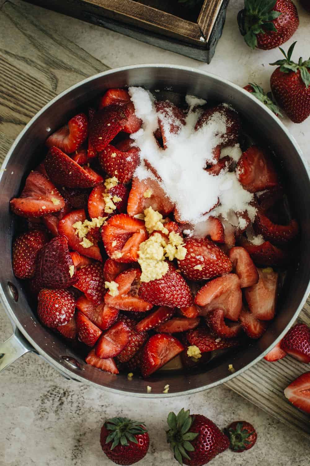 strawberry topping ingredients in a saucepan