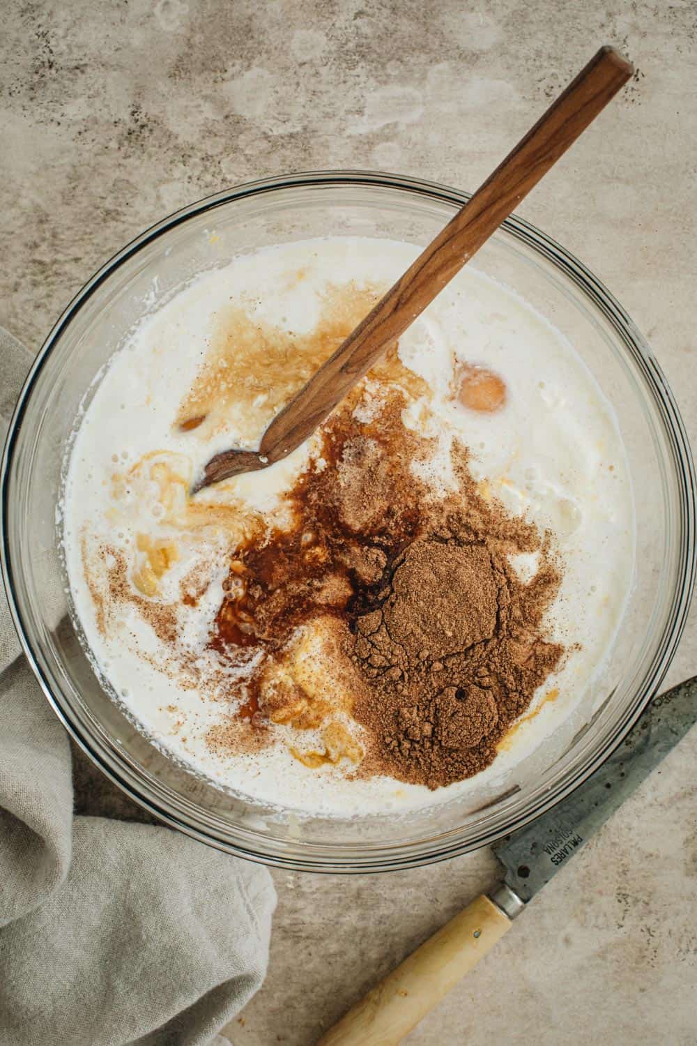 Batter for pumpkin french toast casserole in a mixing bowl.