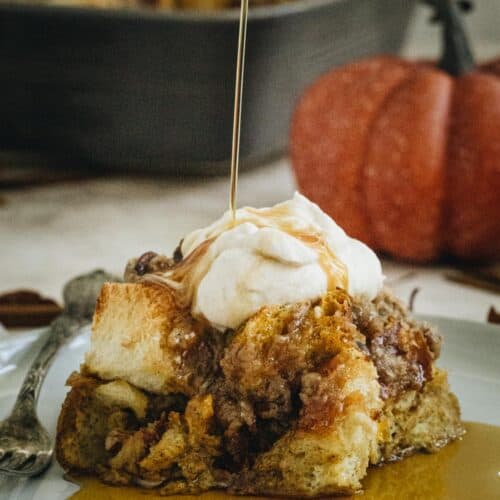 Pumpkin french toast casserole square on a white plate.