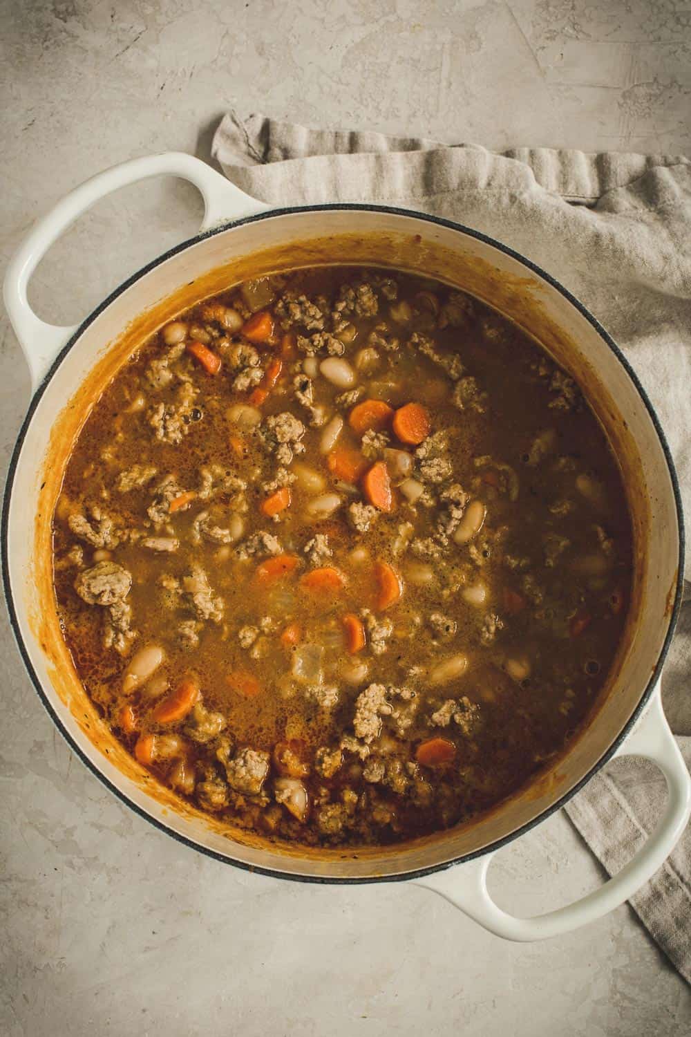 Simmering all the pumpkin white bean chili ingredients.