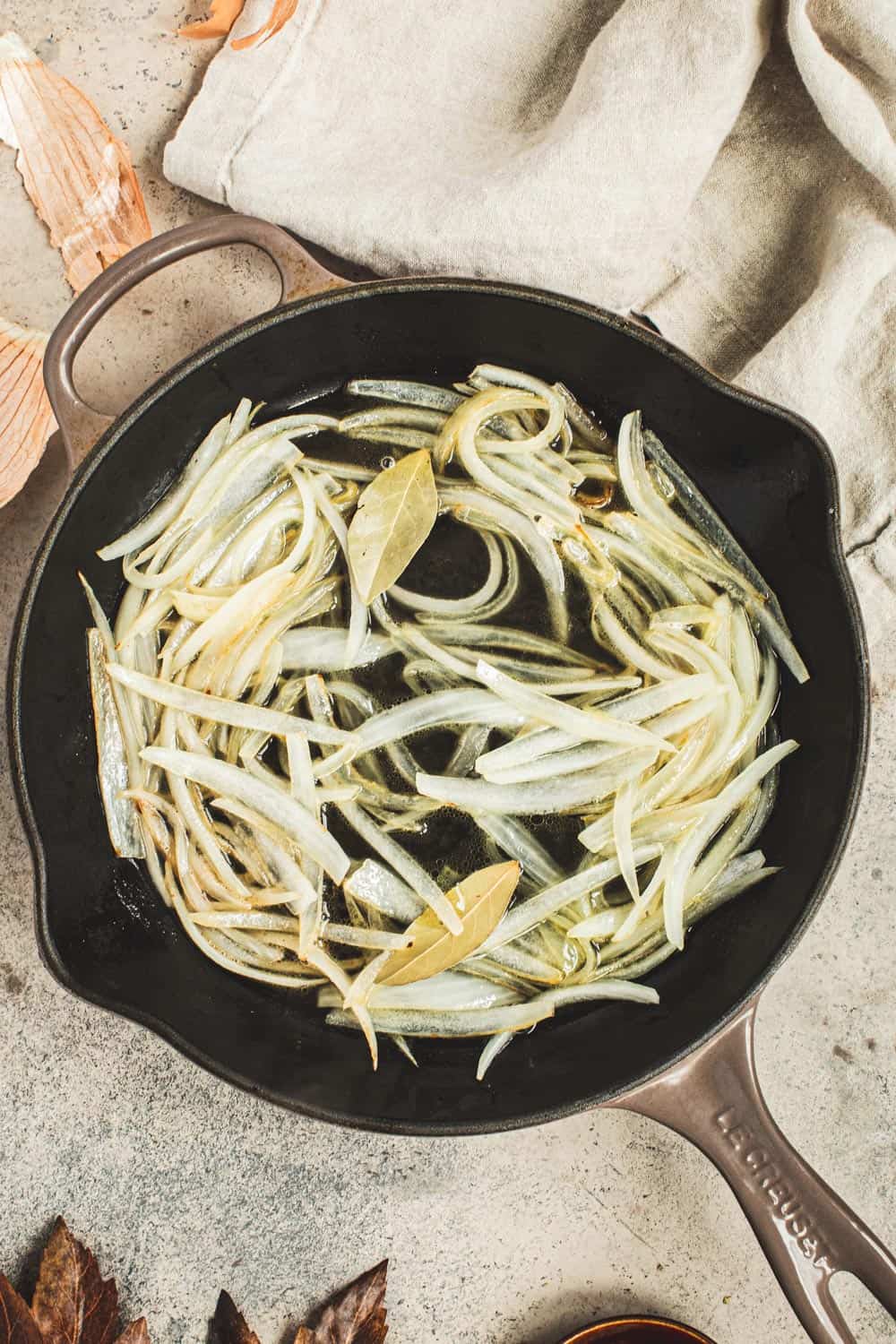 Sautéed onions in an iron skillet.