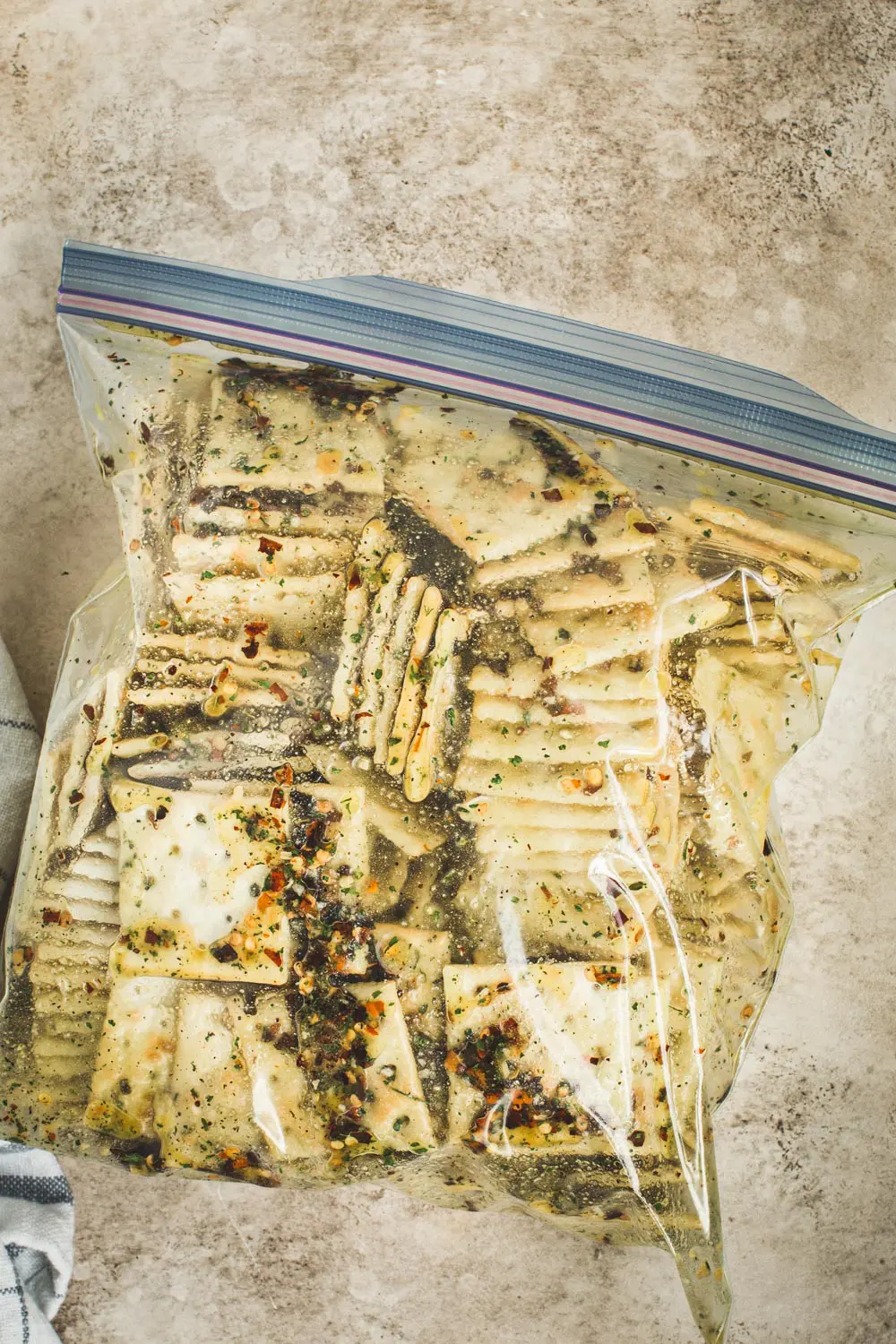 Crack crackers in a sealed Ziplock bag.