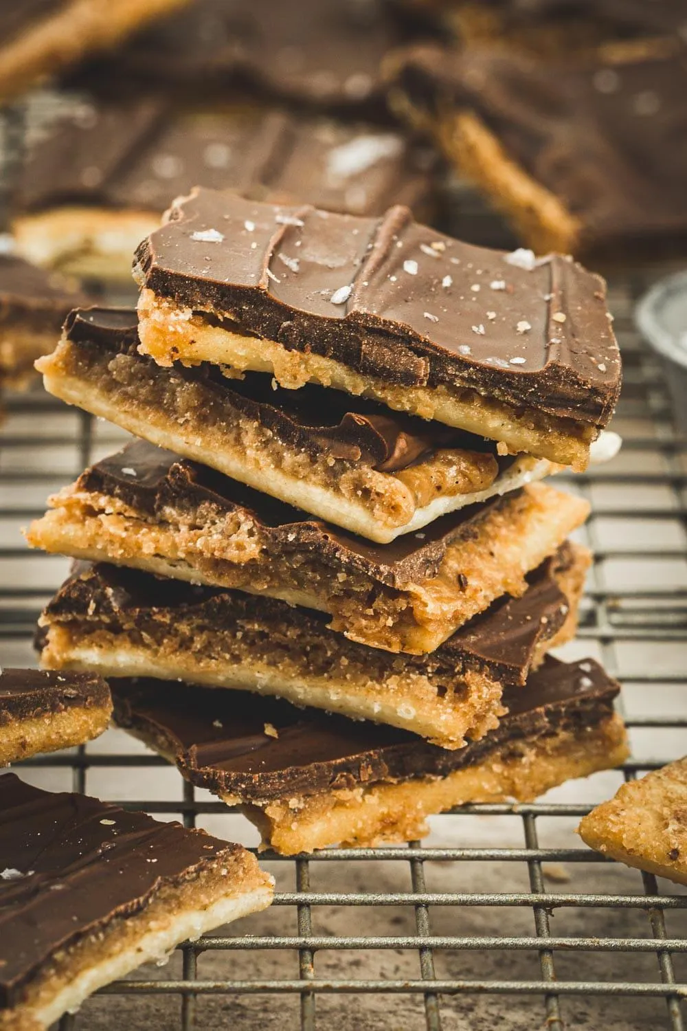 Toffee bark stack on a wire rack.