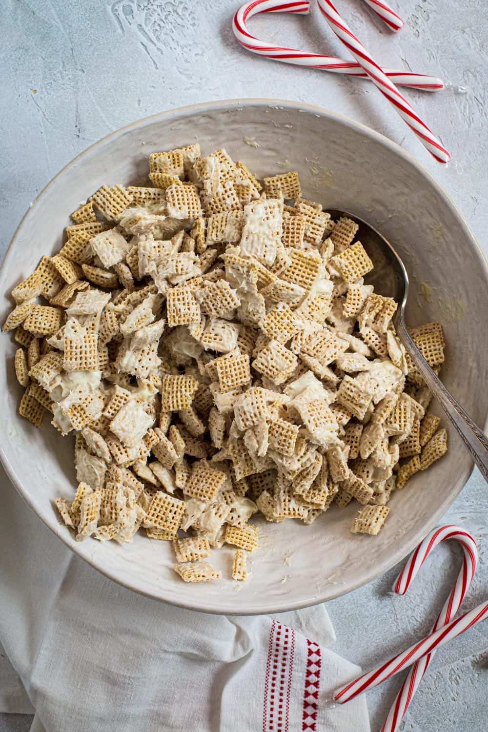 Melted white chocolate mixed with Chex cereal.