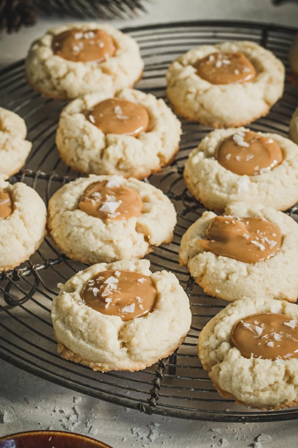 Dulce de leche thumbprint cookies topped with salt flecks.