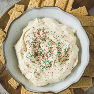 Gingerbread cheesecake dip with Christmas sprinkles.