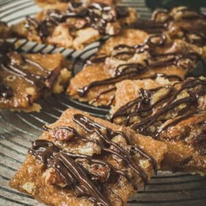 Praline bars on a round wire rack.