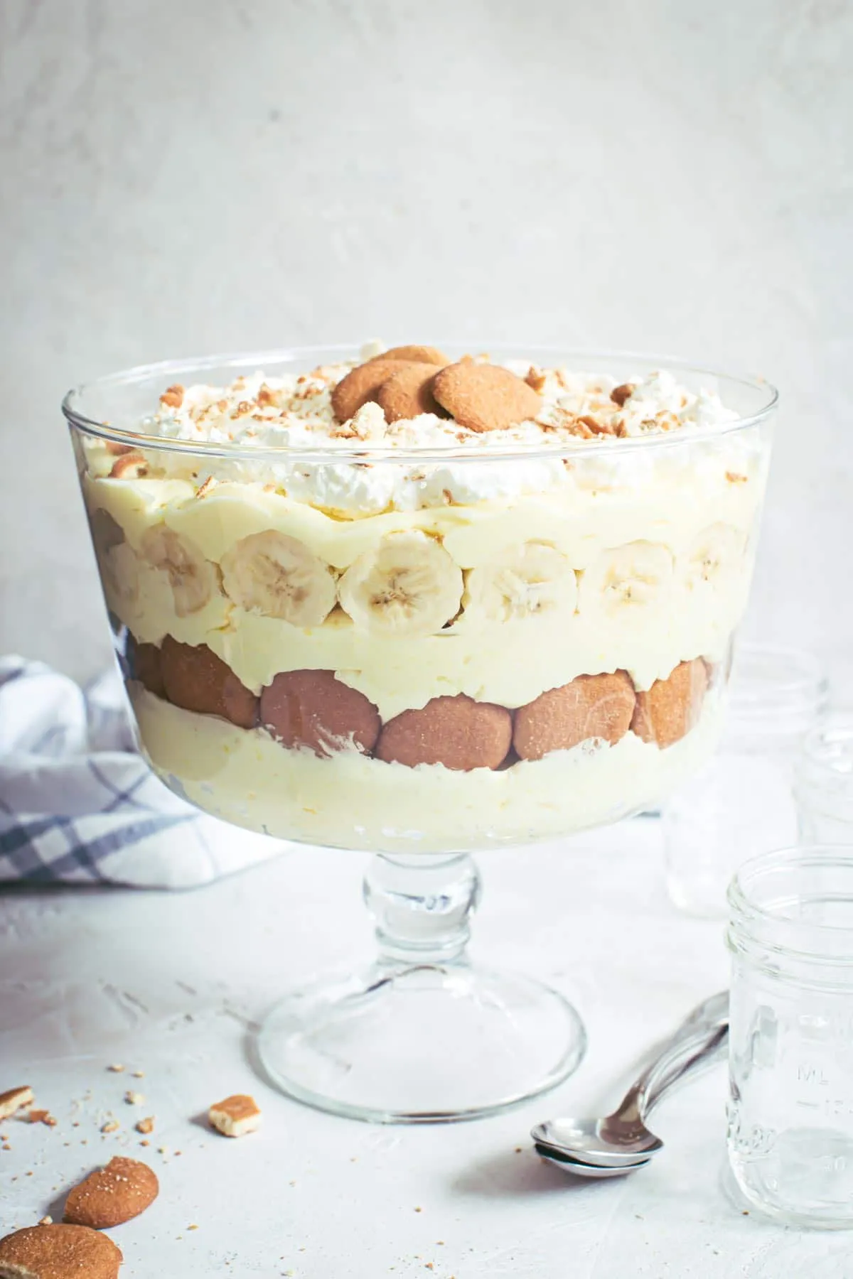 Banana pudding trifle layered with vanilla wafers and bananas.