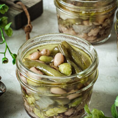 Half-pint jar filled with three bean salad.
