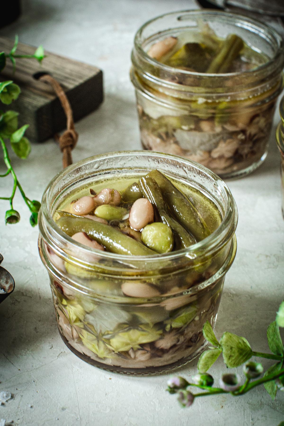 Half-pint jar filled with three bean salad.