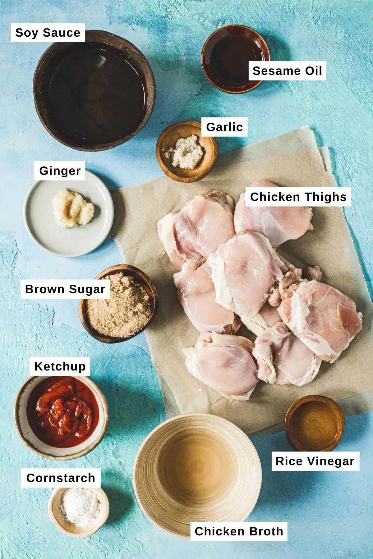 Huli huli chicken ingredients on a blue counter.