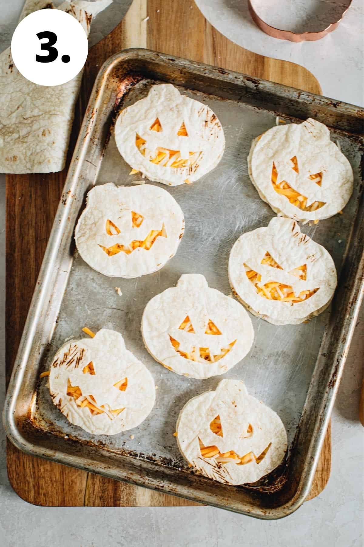 Jack-O-Lantern oven quesadillas process step 3.