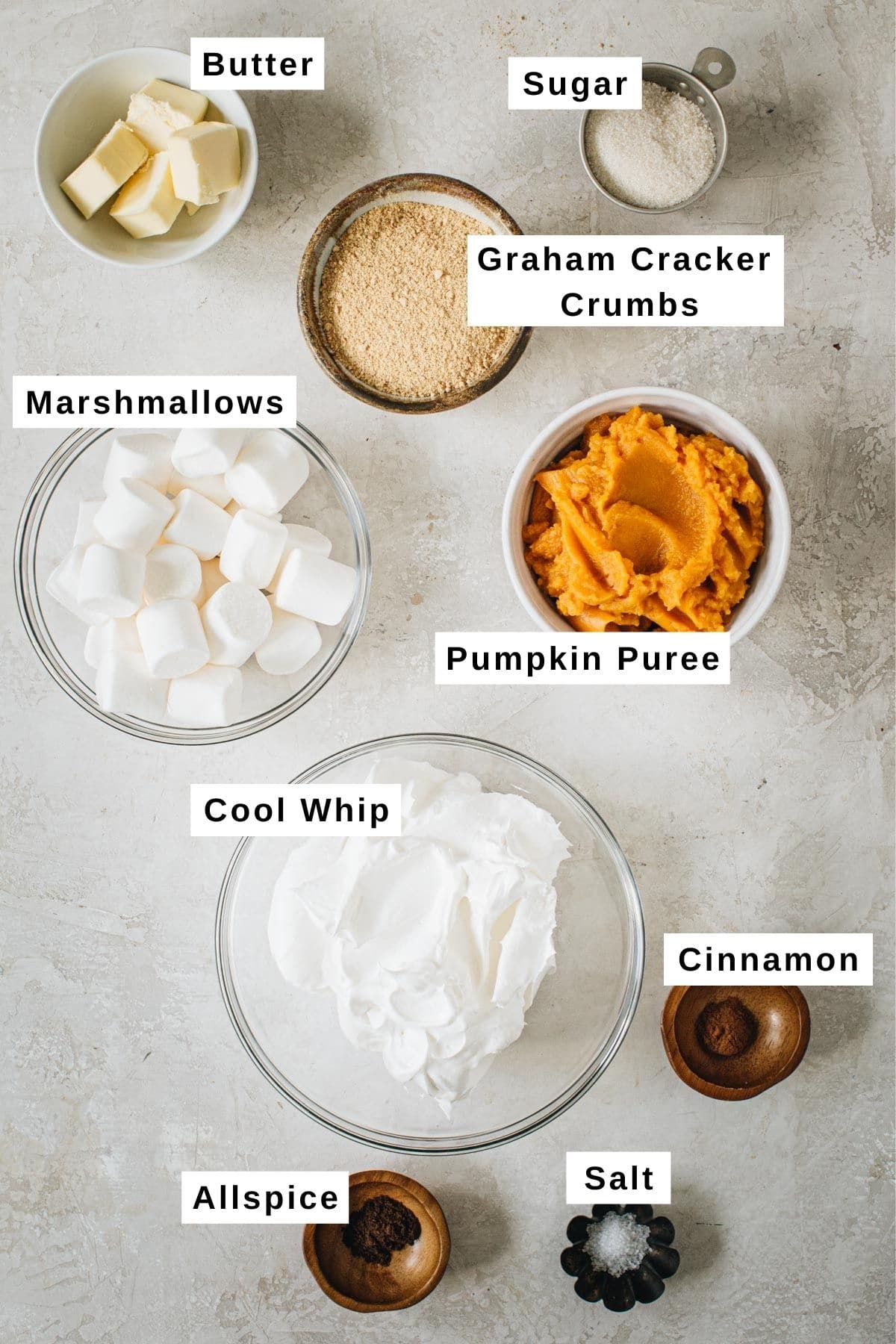 No-bake pumpkin pie ingredients in various bowls