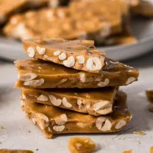 Stack of microwavable peanut brittle.