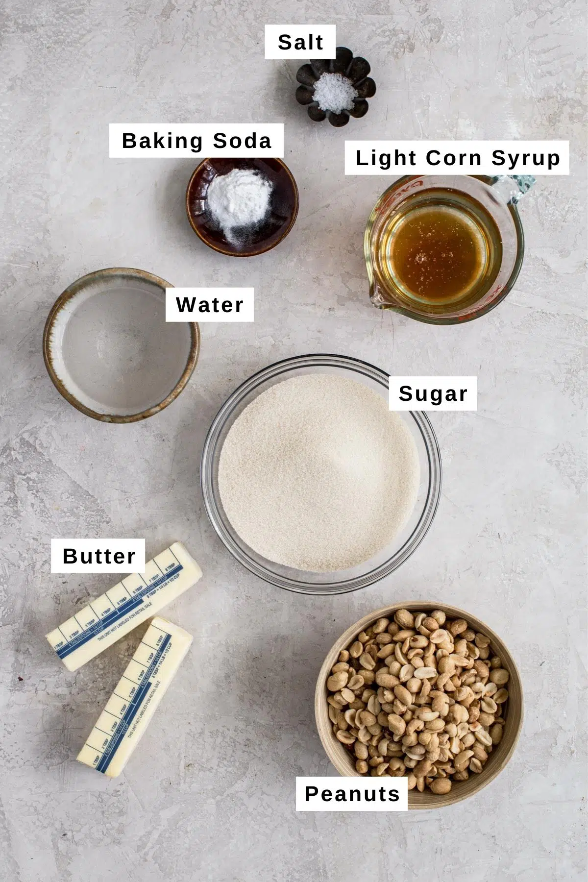 Microwave peanut brittle ingredients in various bowls.