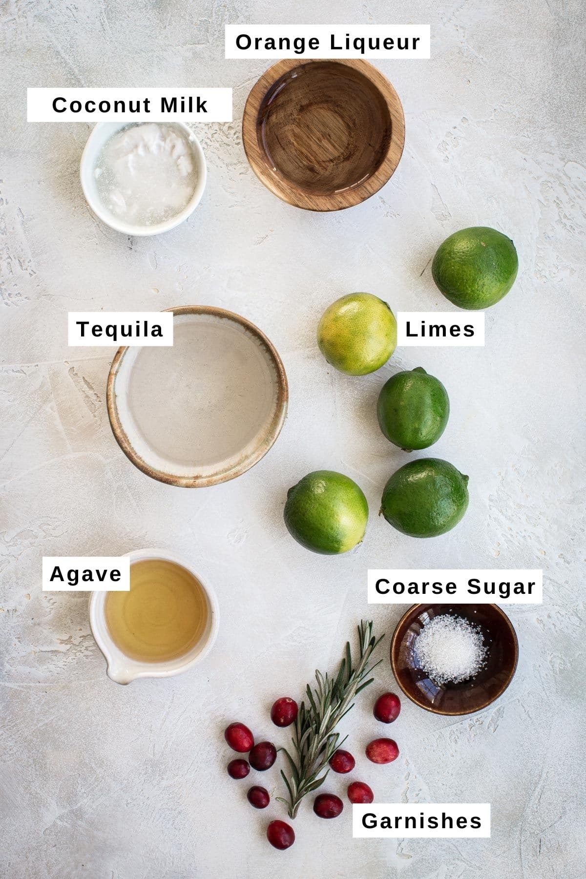 White Christmas margarita ingredients in various bowls.