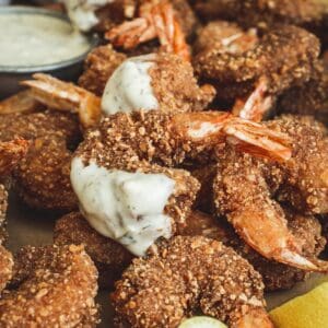 Crispy breaded shrimp dipped in tartar sauce.
