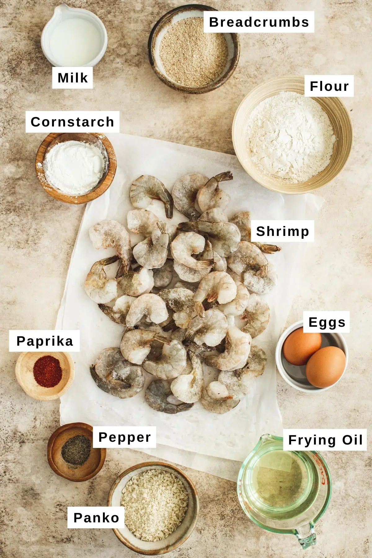 Crispy breaded shrimp ingredients in various bowls.